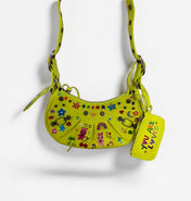Fluorescent Yellow Balenciaga bag hand-painted by Humberto Cruz